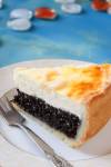 a slice of German Cheesecake with poppy seed filling and quark
