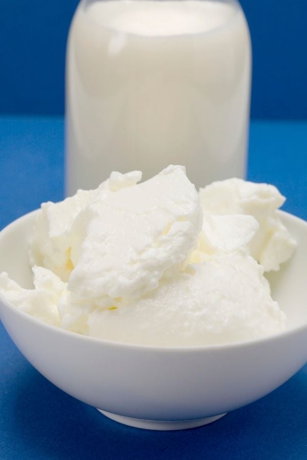 a small bowl filled with quark used for German cheesecake recipe