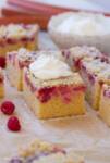 overhead shot of a rhubarb raspberry crumble cake with streusel topping