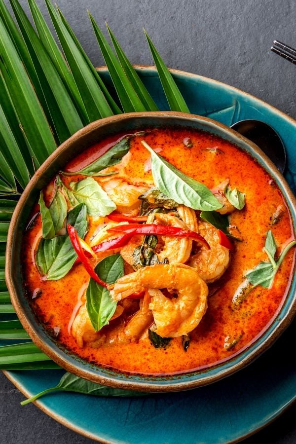 overhead shot of a serving of low carb and paleo Brazilian Shrimp Stew Moqueta topped with fresh chili 