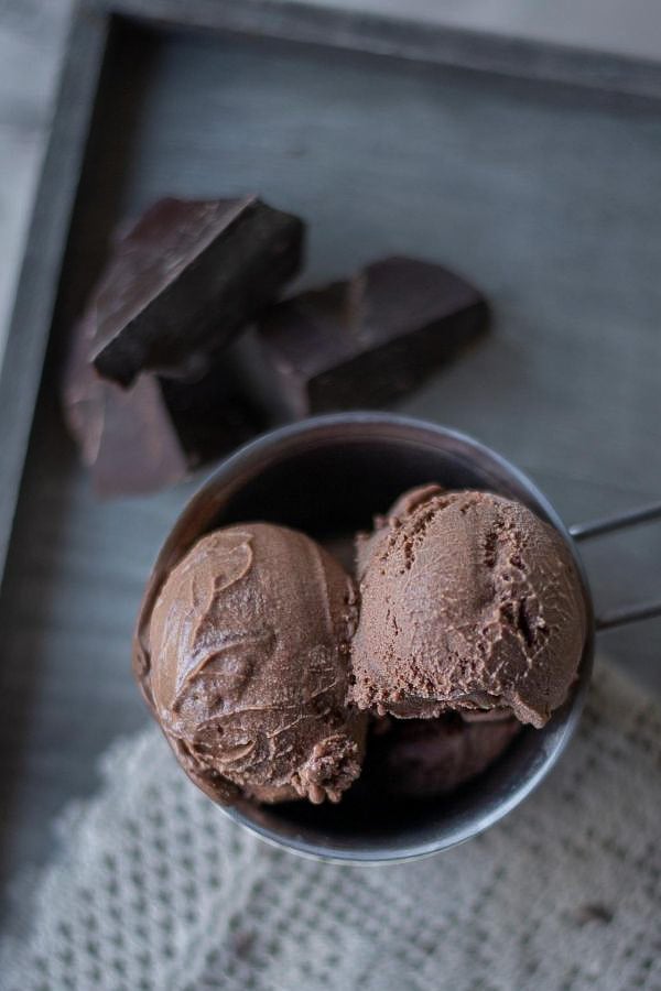 dark chocolate ice cream with rum in a metal cup