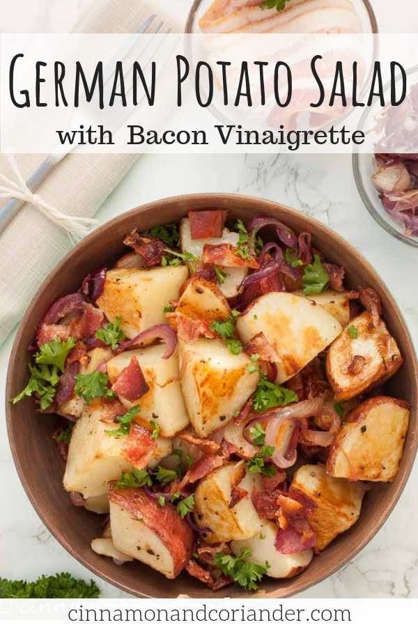 This Authentic German Potato Salad recipe will become your new go-to in no time! Crispy Baked Potatoes, Caramelized Onions, Bacon Bits and a warm Bacon Vinaigrette take this traditional German recipe to a whole new level! #German, #potatosalad, #easy, #traditional, #side