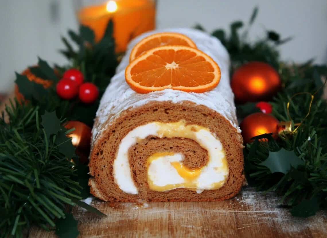 Gingerbread Cake Roll filled with a sweet and tangy Tangerine Curd and Vanilla Whipped Cream