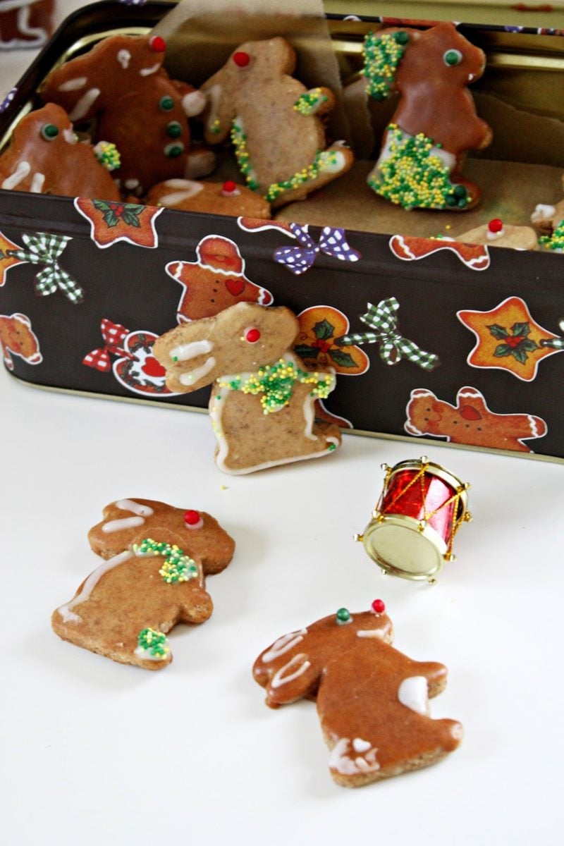 Soft gingerbread cookies shaped as bunnies in a Christmas cookie tin