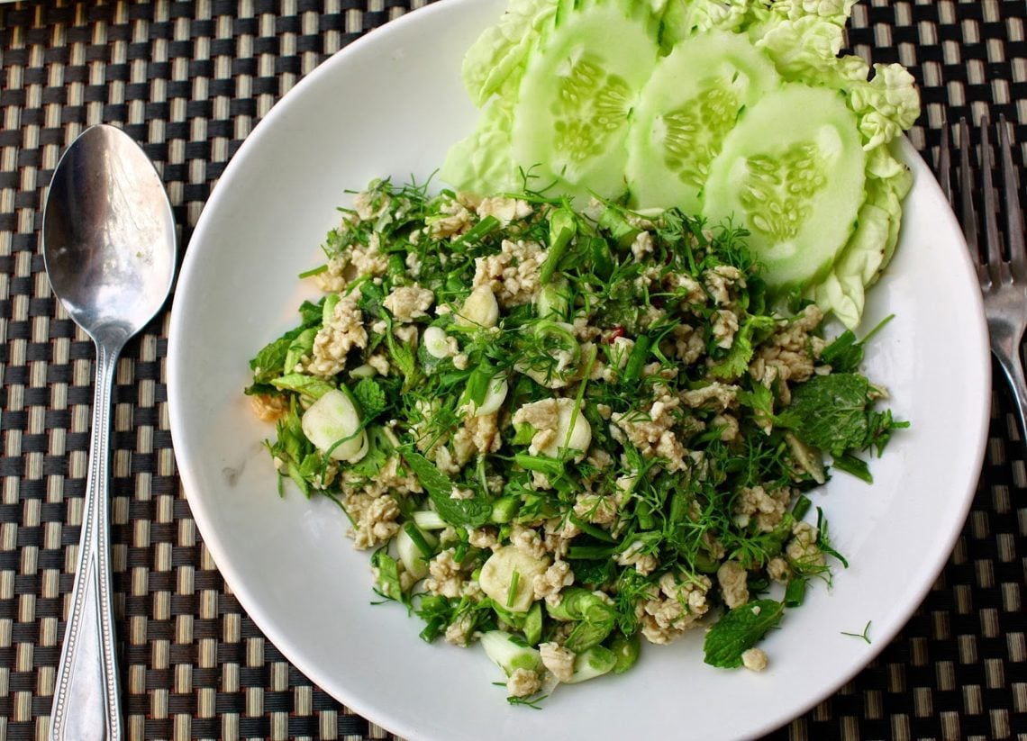 Laotian Chicken Larb Salad on a white plate - overhead shot