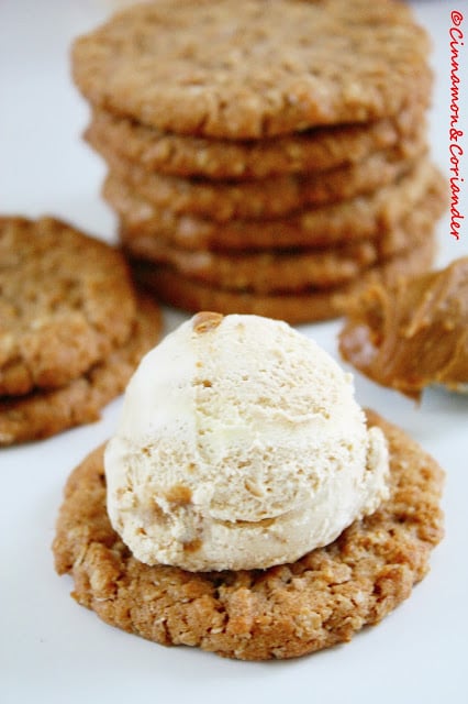 Biscoff Oatmeal Cookie being topped with a scoop of Ice Cream 