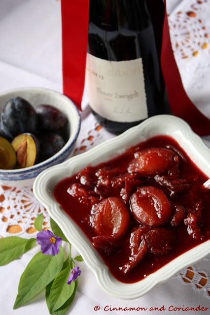 Austrian mulled stewed plums served in a white bowl
