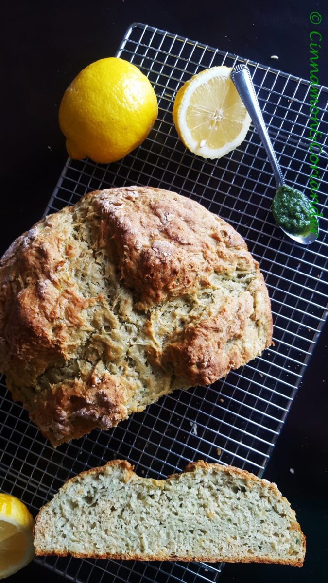 Irish Potato Bread with lemon and herbs being cut into slices