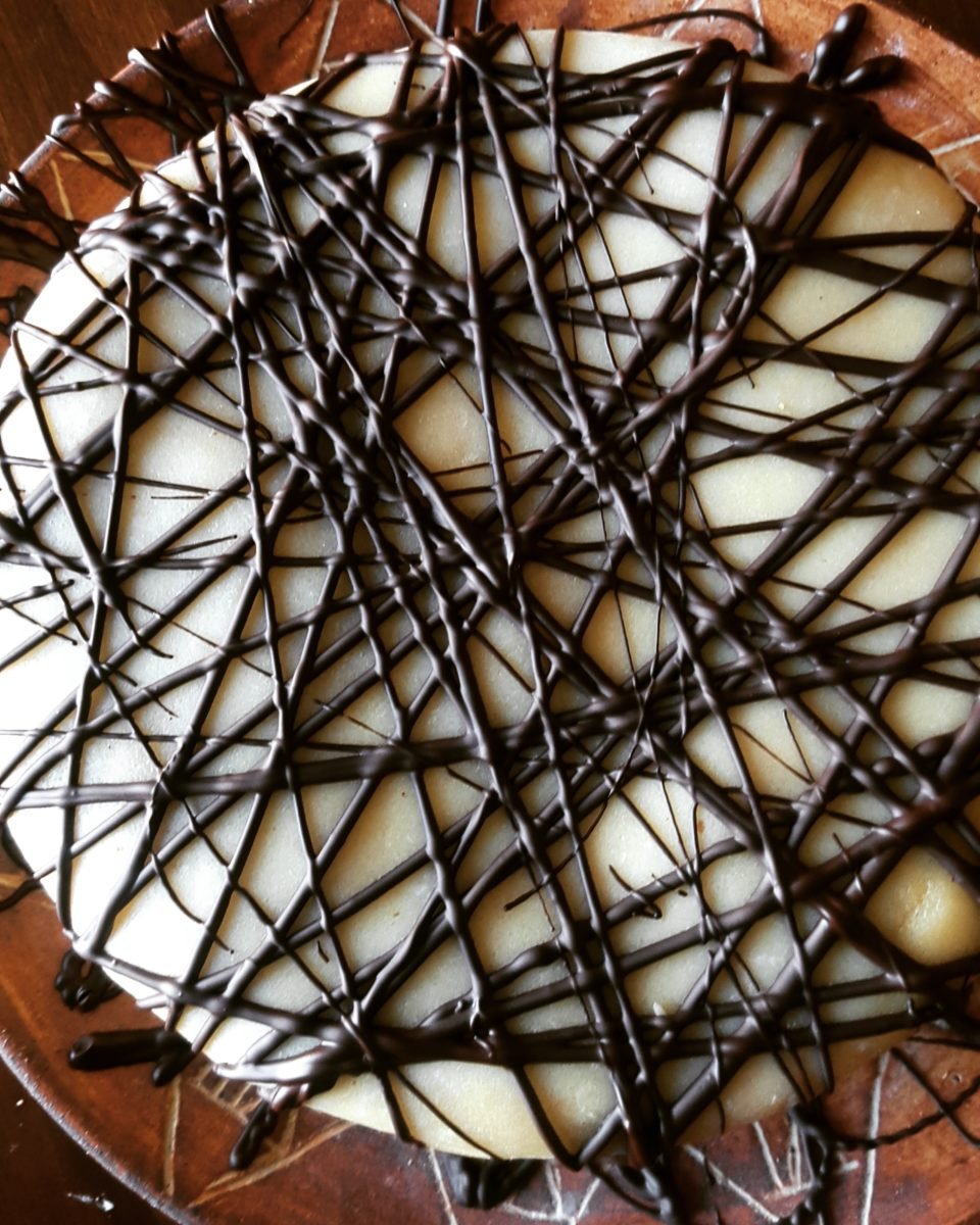 german marzipan hazelnut cake covered with marzipan and chocolate