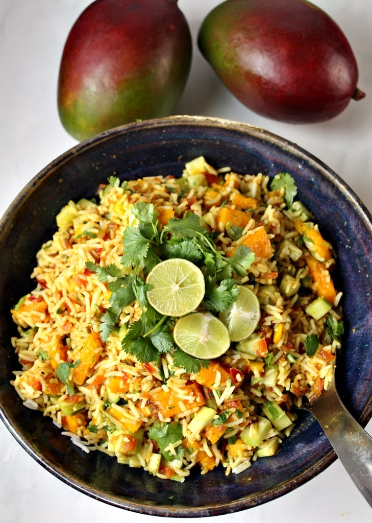 Indian Rice Salad with Mango and Lime Dressing in a blue salad bowl