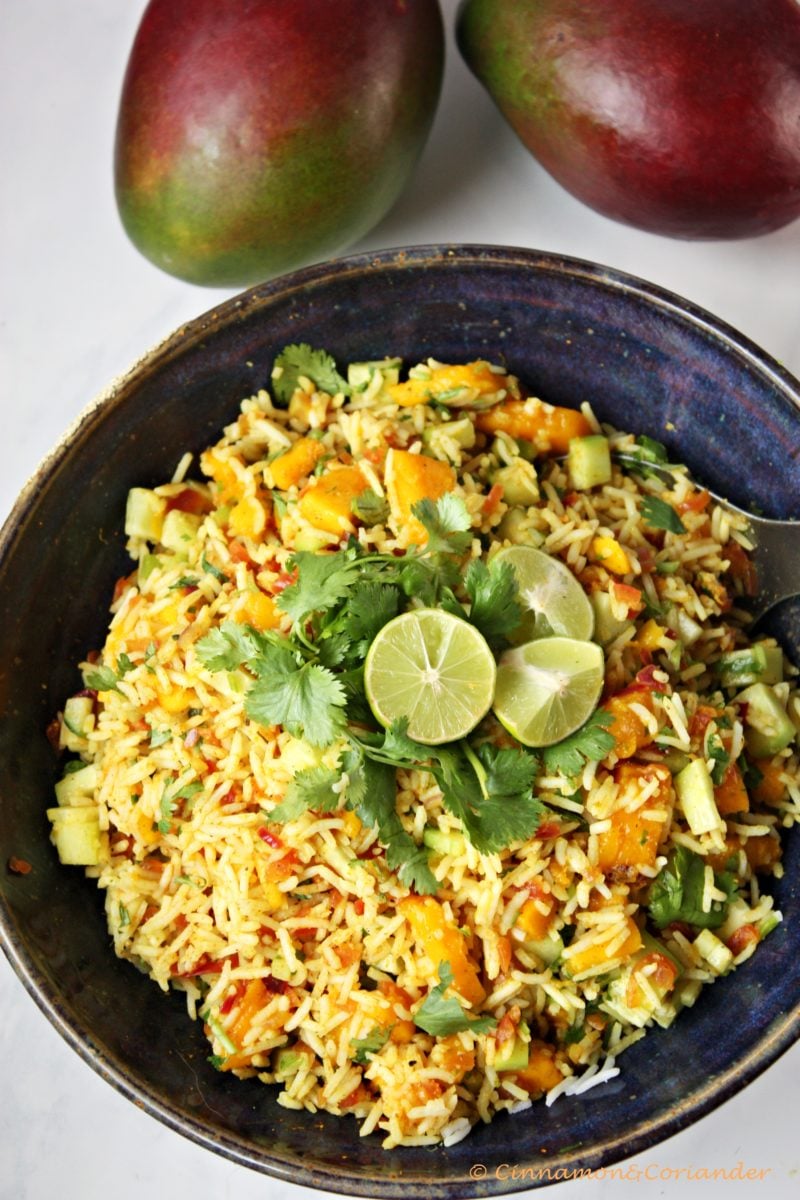 Vegan Indian Rice Salad with Mango and Lime Dressing in a big salad bowl