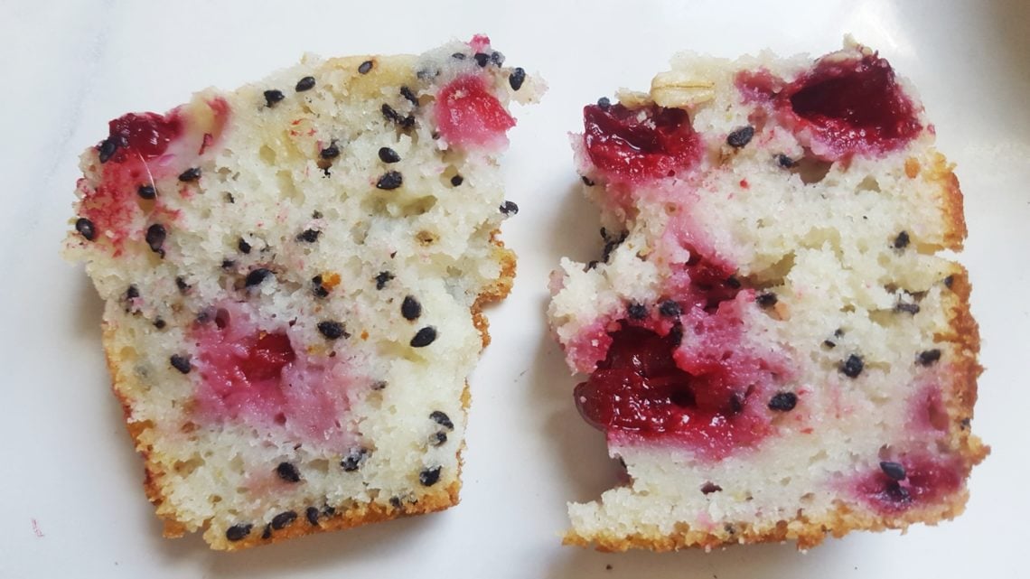 a slice of cherry bread with sesame streusel and lime