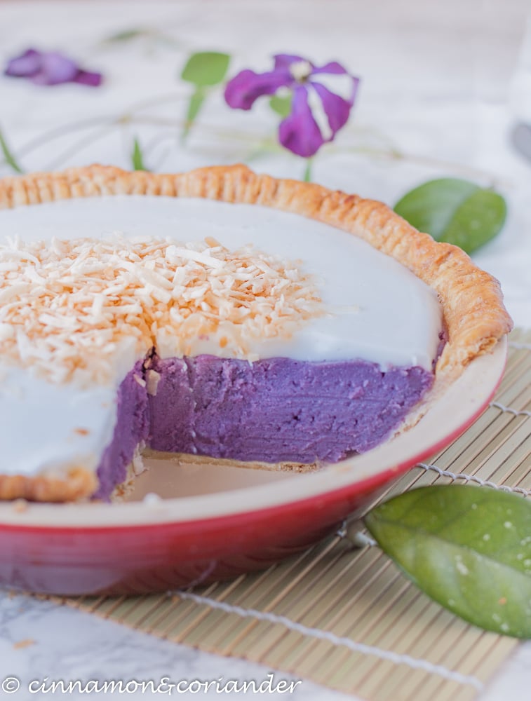 side view of Okinawan Sweet Potato Pie with Haupia Coconut Topping in a red pie dish