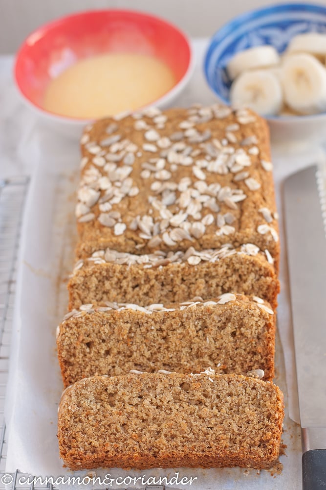 healthy vegan banana bread sliced on a cooling rack