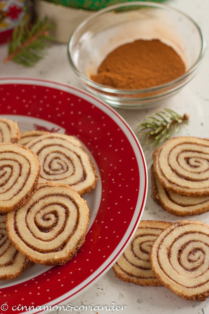 Easy Cinnamon Roll Cookies arranged on a festive cookie plate
