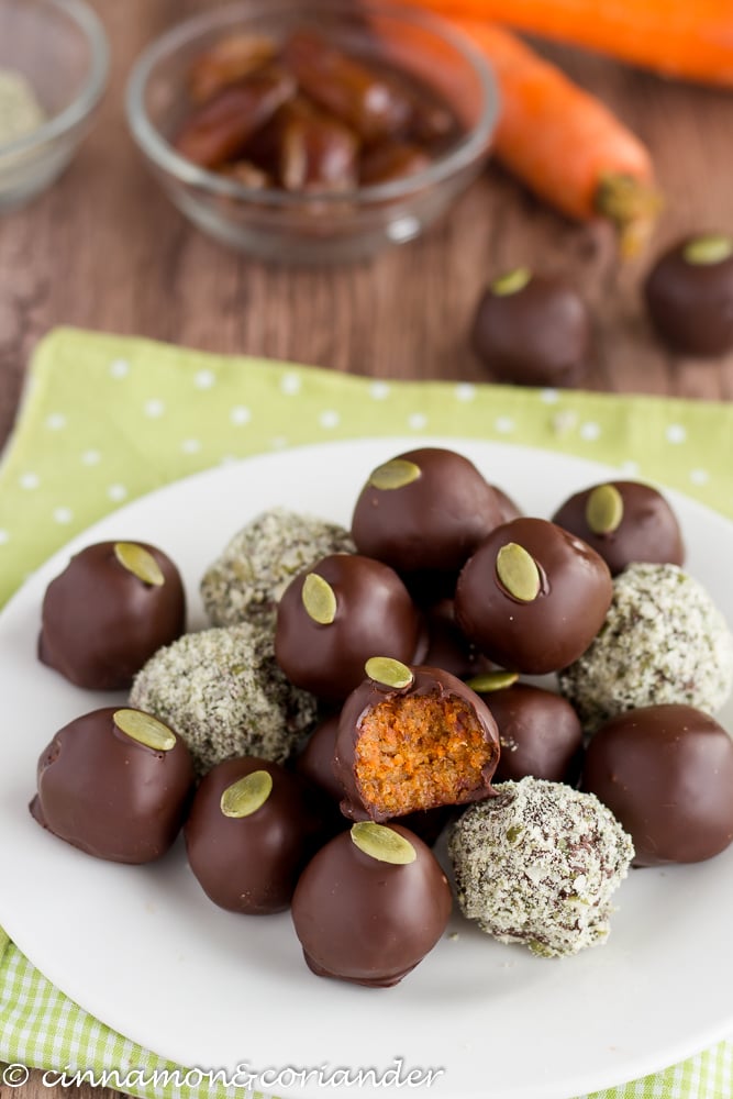 Paleo Vegan Carrot Cake Truffles arranged on a white plate