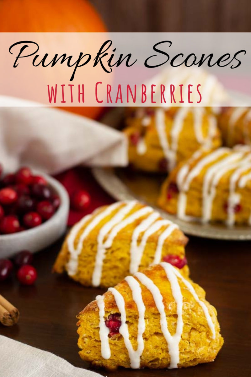 Starbucks Cranberry Pumpkin Scones | These easy scones are the best pumpkin scones out there. Moist and flaky seasoned with pumpkin spice, studded with fresh cranberries and drizzled with cream cheese icing! A recipe with no eggs! #halloween, #thanksgiving, #sconesrecipe, #starbucksrecipe, 