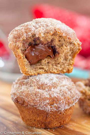 Nutella-Stuffed Gingerbread Snickerdoodle Muffins with liquid center stacked on top of each other