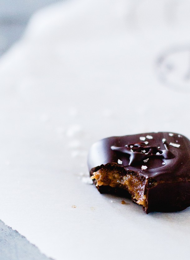 Chocolate Covered Date Caramels on parchment paper