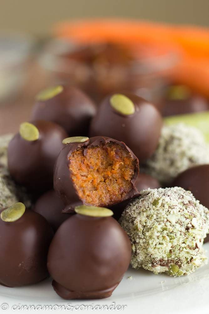 paleo vegan carrot cake truffles on a white plate