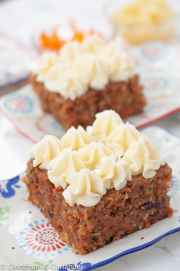 award-winning carrot cake with cream cheese icing on a plate