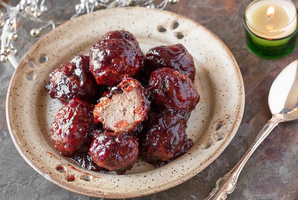 healthy paleo cranberry glazed baked turkey meatballs on a small brown plate