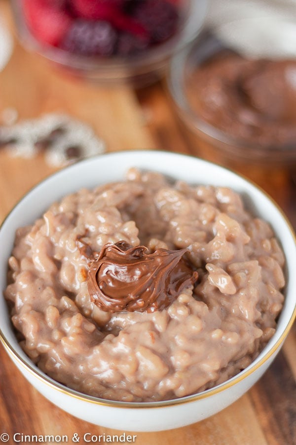creamy Nutella Instant Pot Rice Pudding topped with sugar-free hazelnut chocolate spread