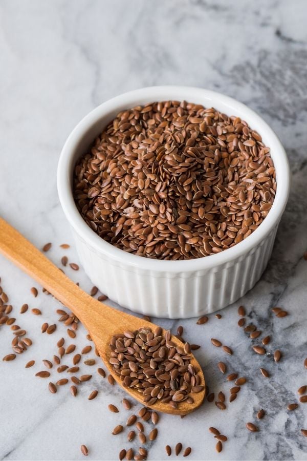a small dish with flax seeds for making flaxseed gel recipe 