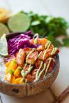 healthy Mexican Shrimp Tacos Bowl with charred shrimp mango salsa, rice and cilantro lime mayo