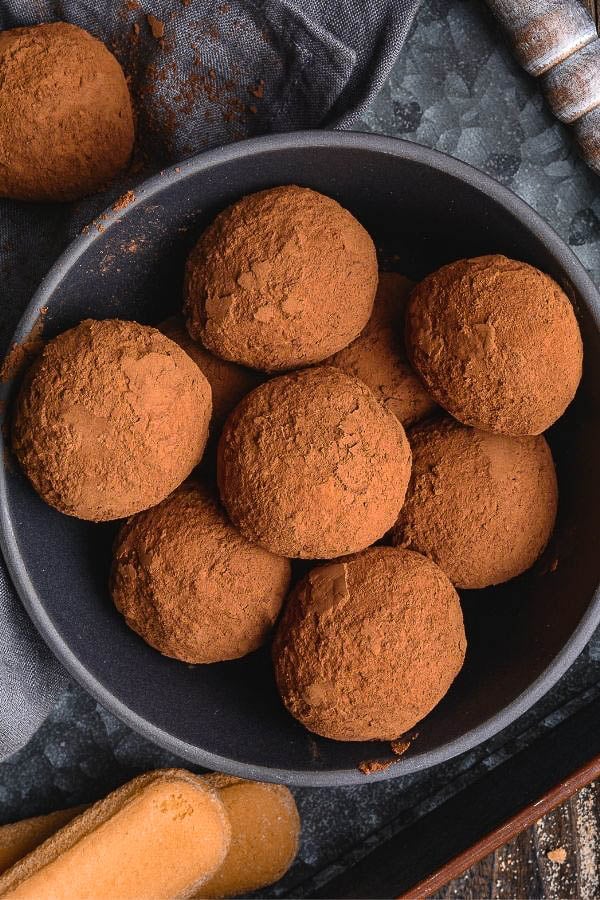 overhead shot of a small bowl with no bake chocolate tiramisu truffles