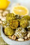 Healthy Vegan Lemon Pistachio Energy Balls in a small stone bowl
