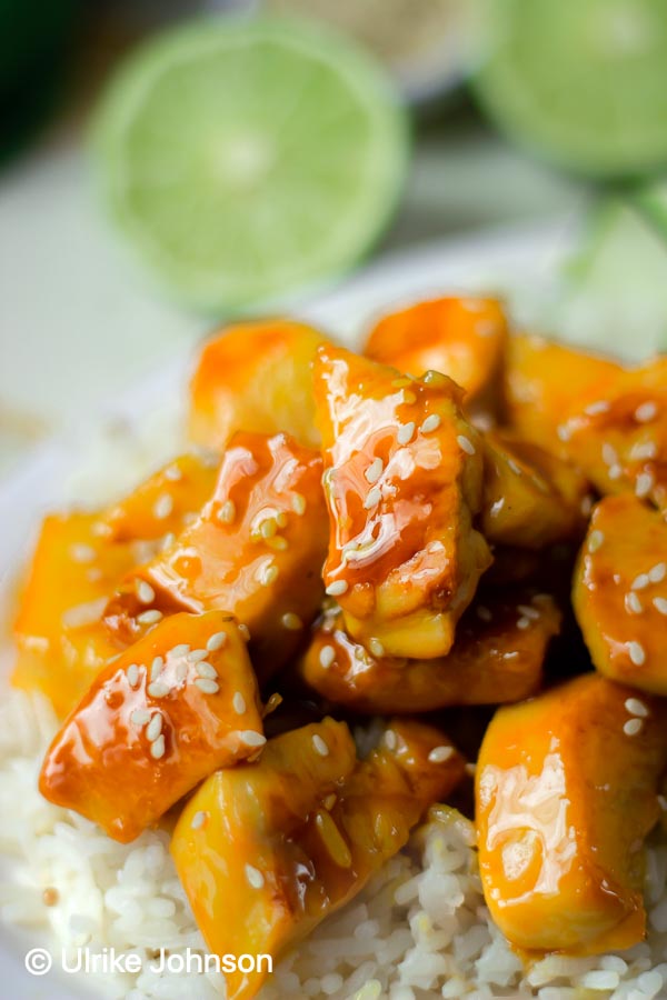 easy healthy Chinese Orange Chicken with sugar-free orange sauce served over steamed rice
