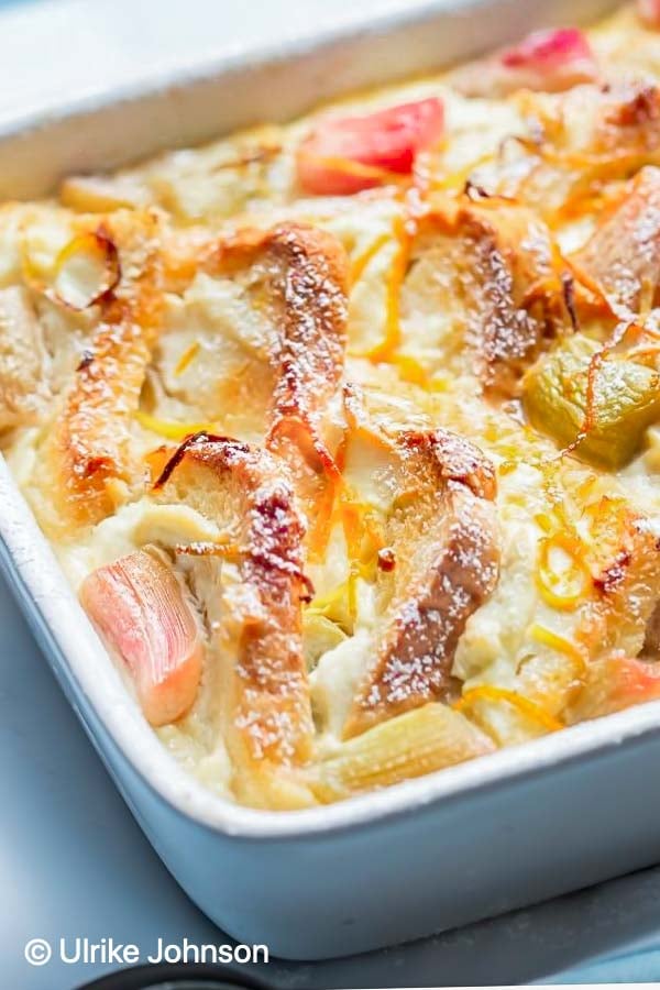 old-fashioned rhubarb bread pudding dusted with icing sugar 