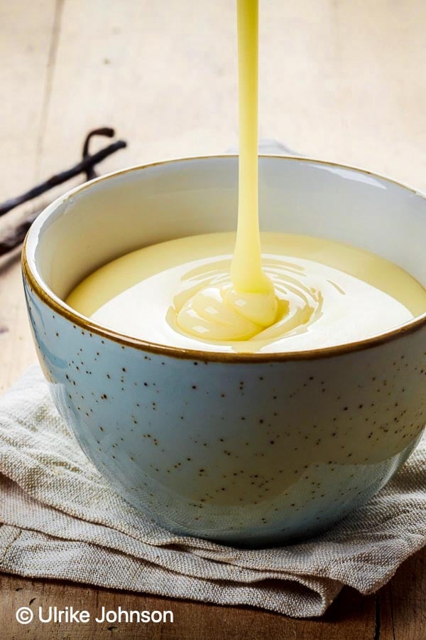 homemade creme anglaise in a small bowl 