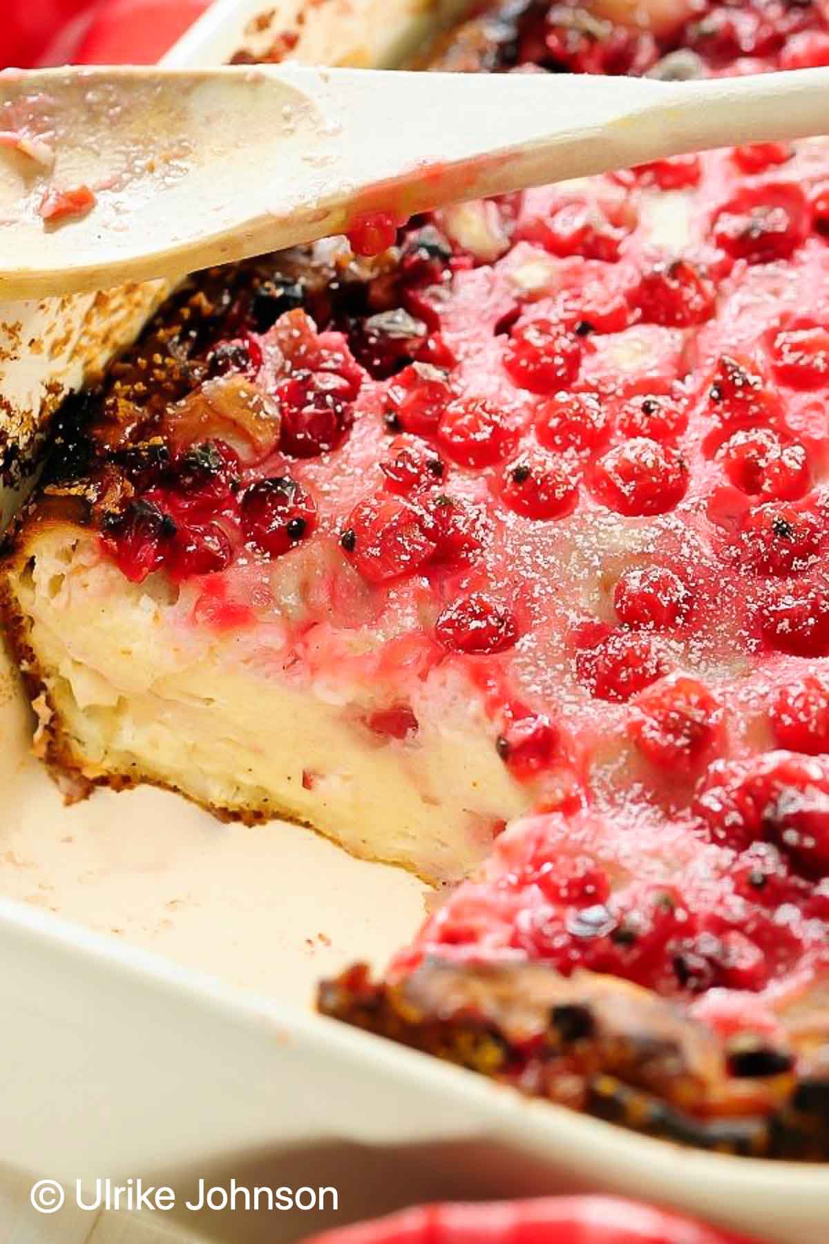 low carb German cheesecake casserole topped with red currants 