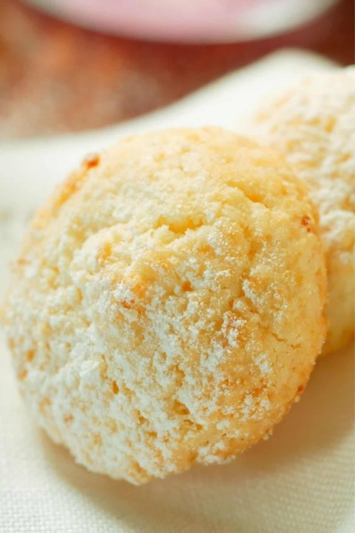 cream cheese almond cookies dusted with icing sugar