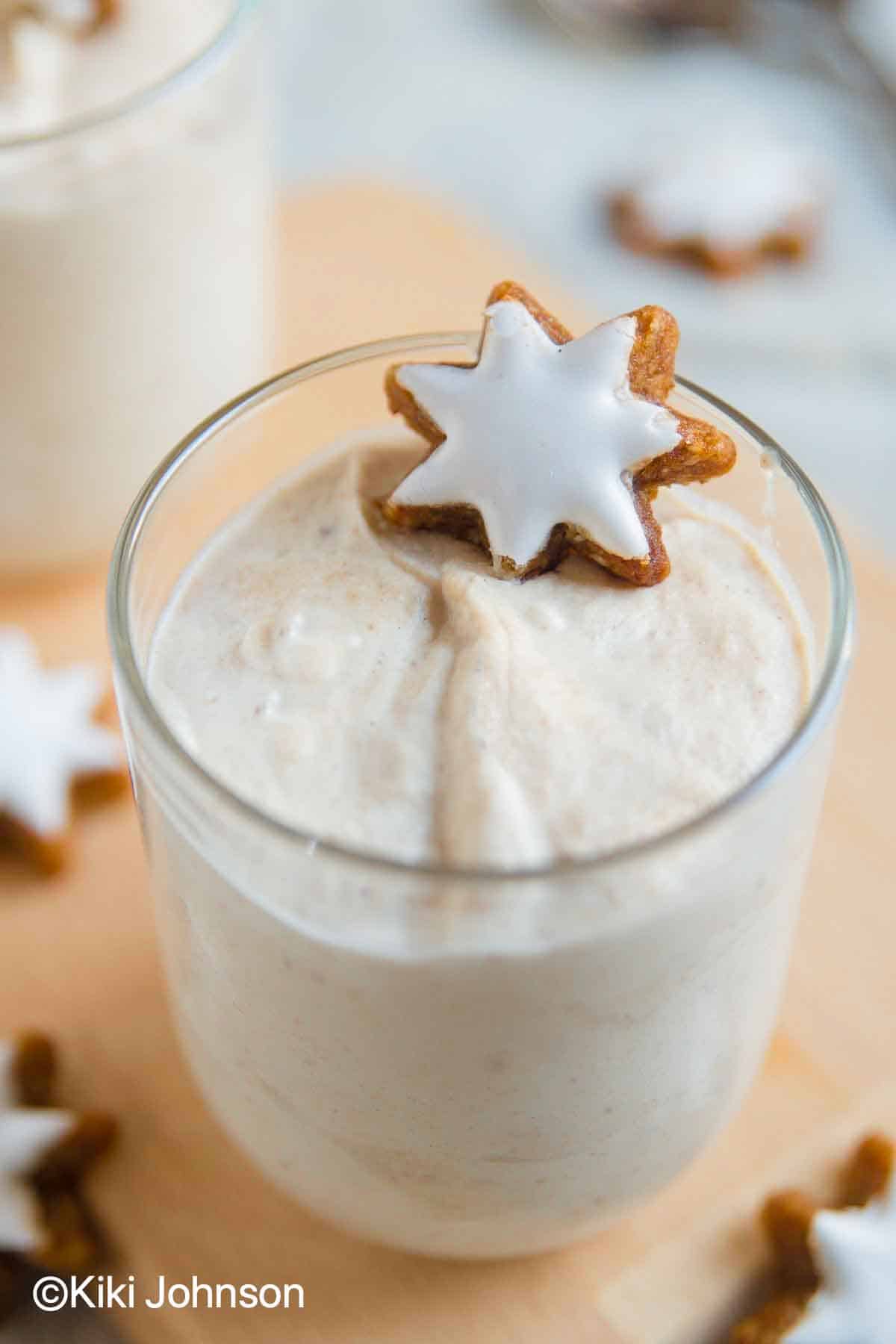 gingerbread mascarpone cream dessert served in a glass with a cinnamon star cookie