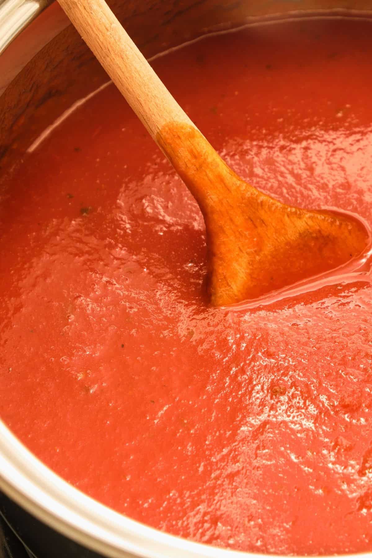 vegan tomato red pepper soup in a pot 