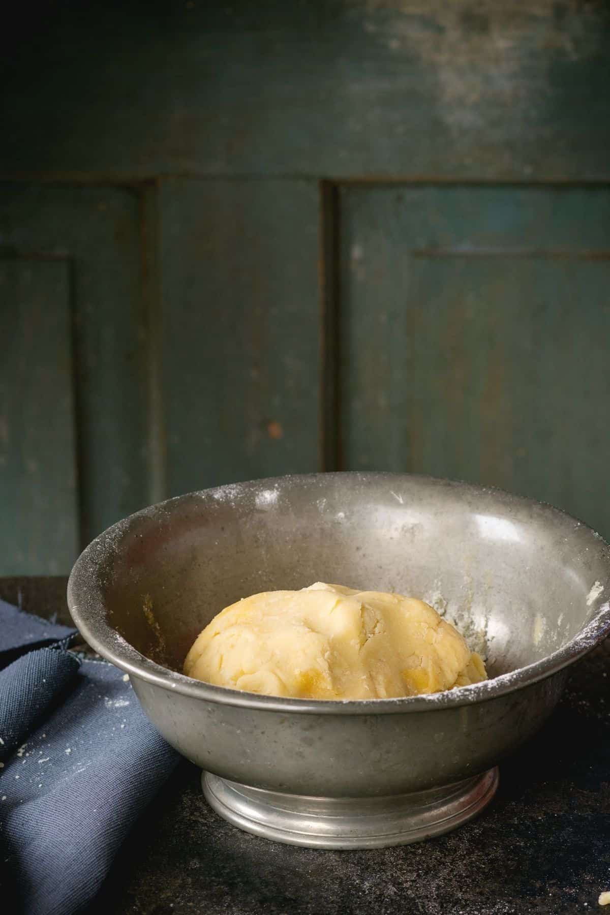 shortcrust pastry in a metal bowl 