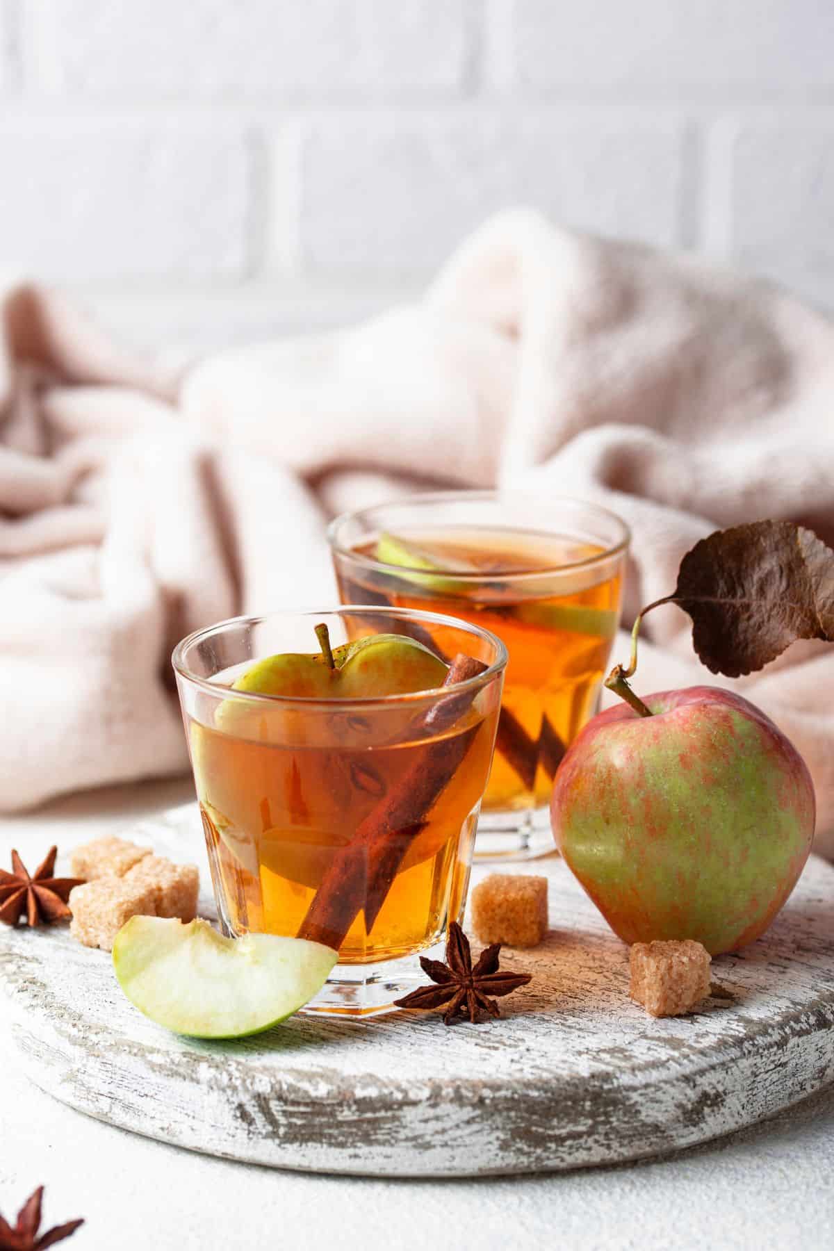 two glasses of apple mulled wine 