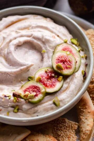 fig spread topped with fresh fig slices and honey