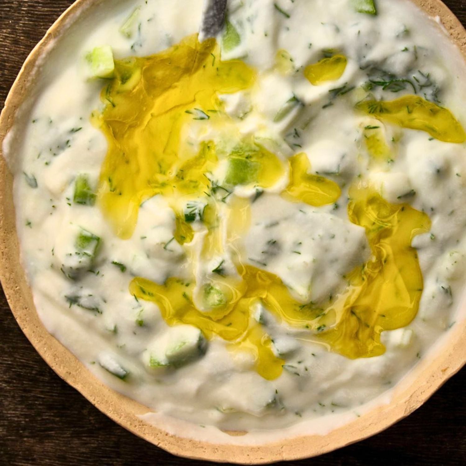 a bowl with homemade tzatziki with greek yogurt